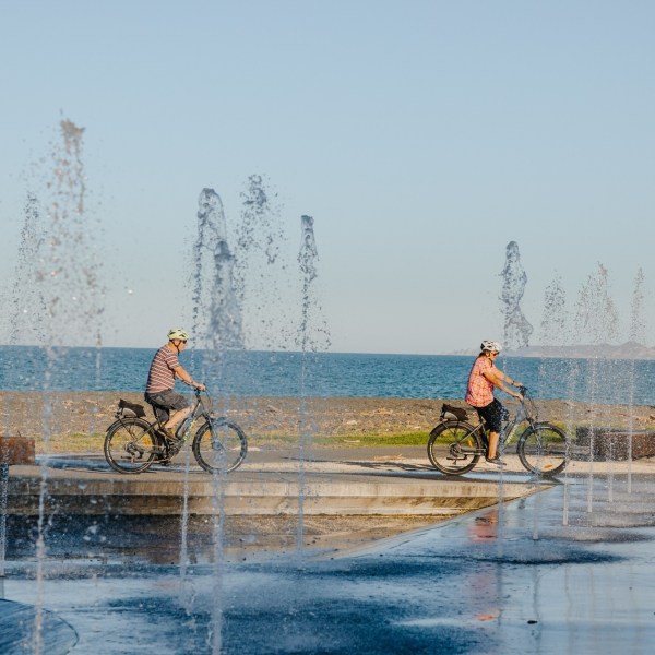 a group of people on a boat in the water